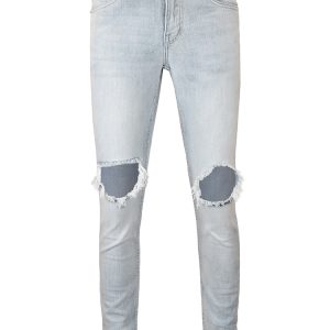 Distressed Skinny Jeans In Mid Wash Blue